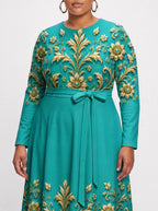 "Heshima" Long Sleeve Midaxi Dress — standing, angled view on model