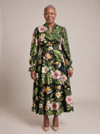 "Kasuku" Long Puff Sleeve Dress — standing, angled view on model
