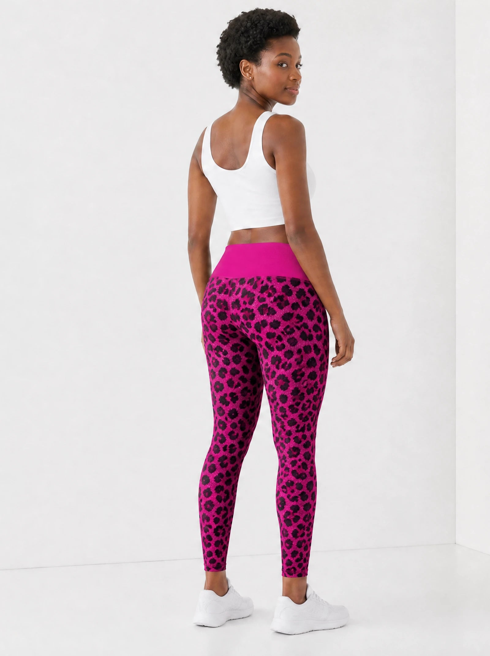 "Unstoppable" Pink Leopard Leggings — back view on model