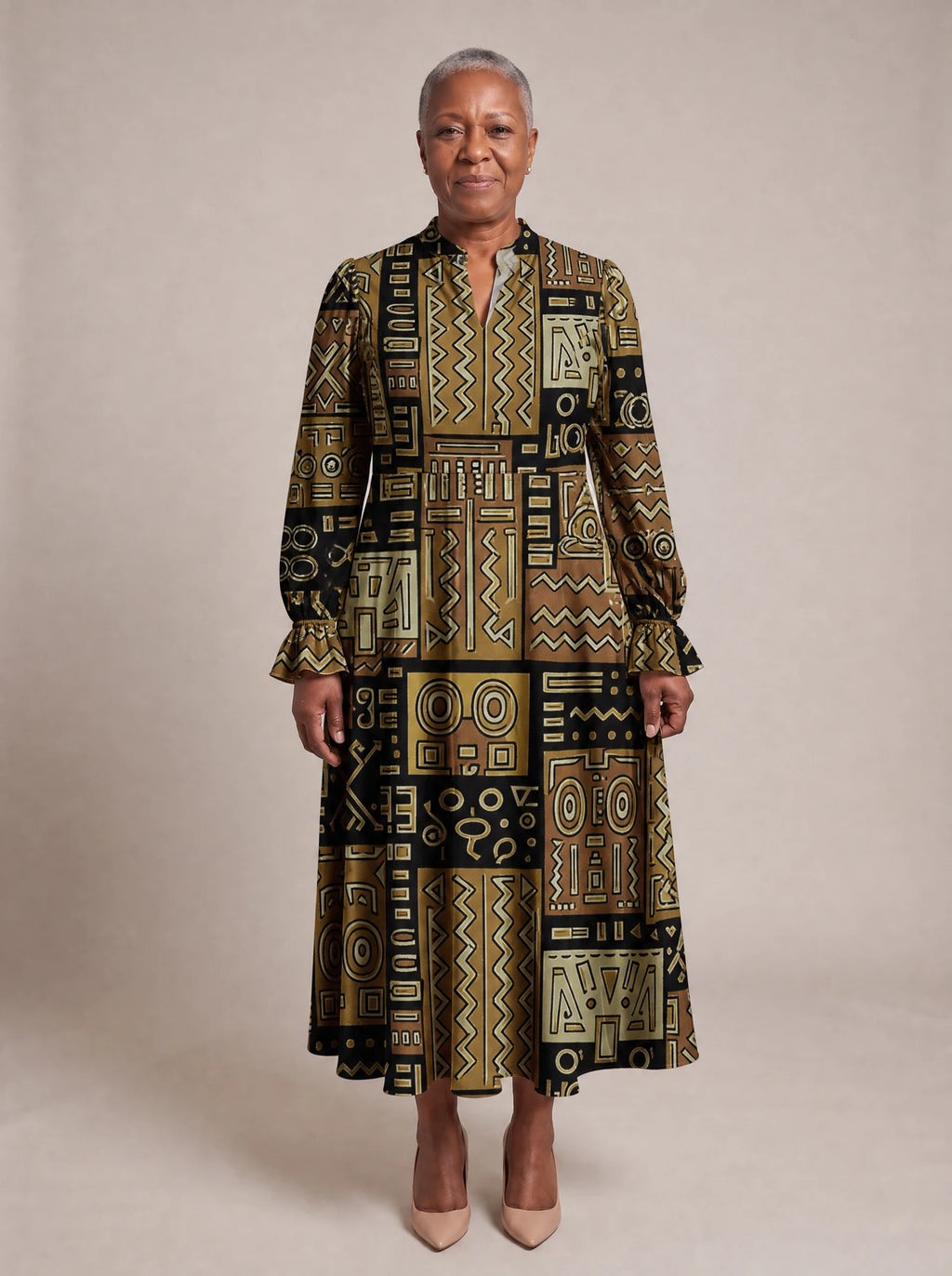 "Sankofa" Long Puff Sleeve Dress — standing, angled view on model