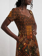 "Mkeka" Sweetheart Midi Dress — close-up of the bodice and the in-seam side pocket