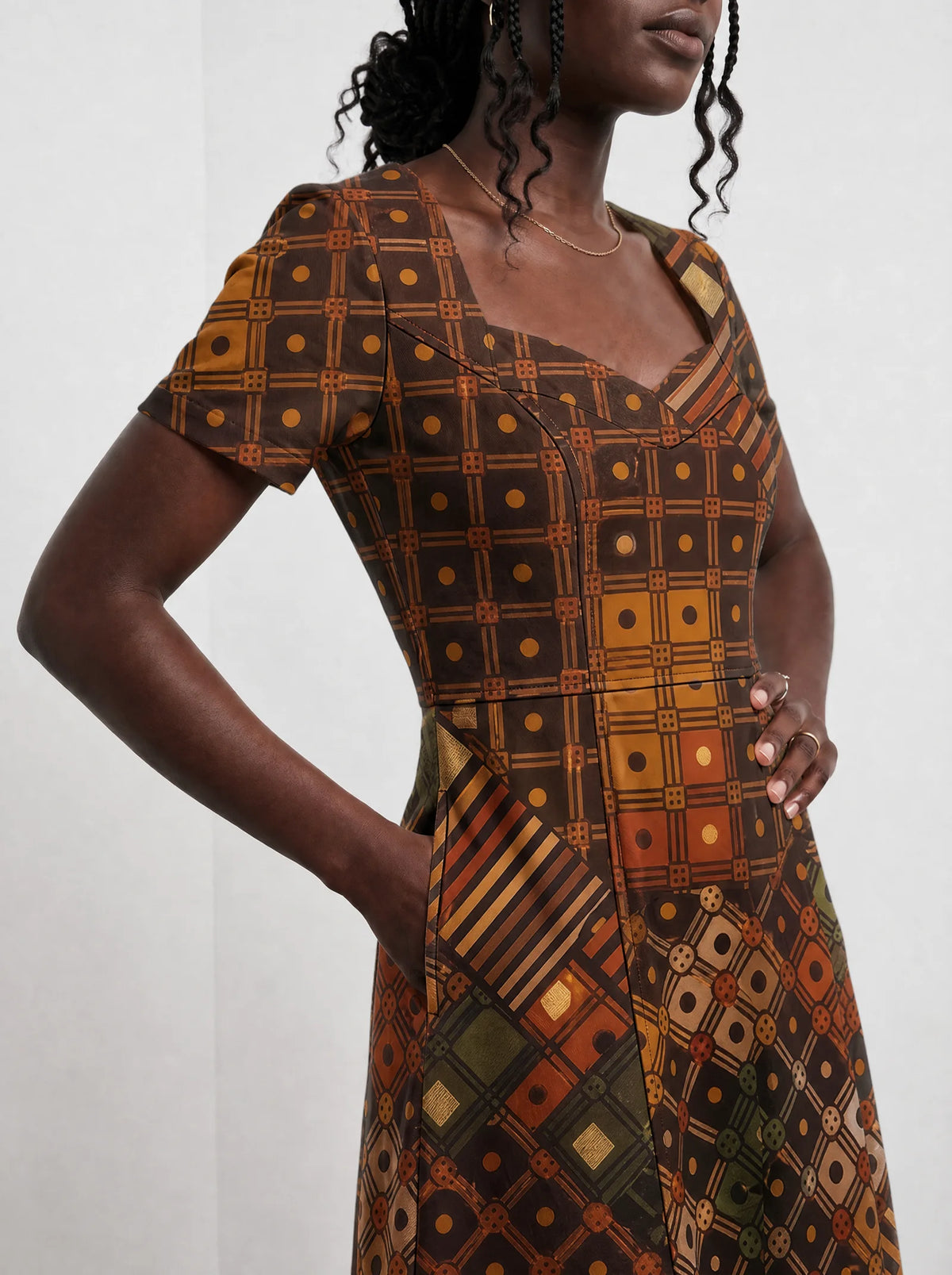 "Mkeka" Sweetheart Midi Dress — close-up of the bodice and the in-seam side pocket