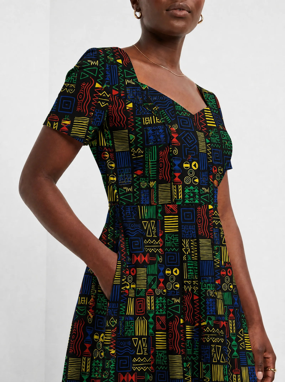 "Michoro" Sweetheart Midi Dress — close-up of the bodice and the in-seam side pocket