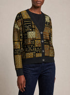 "Sankofa" Knitted Cardigan — close view of the V-neck, buttons and ribbed trims