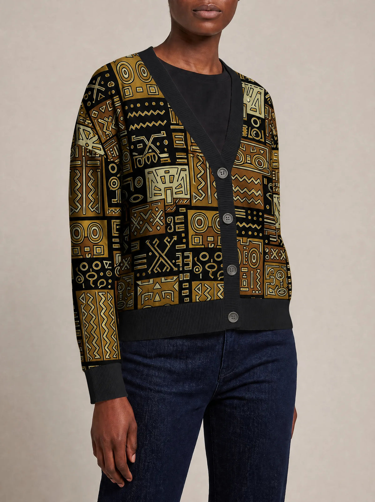 "Sankofa" Knitted Cardigan — close view of the V-neck, buttons and ribbed trims