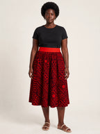 "Shaka Burgundy" Twirl Skirt — front view on model