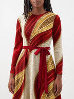 "Utukufu" Long Sleeve Midaxi Dress — standing, angled view on model