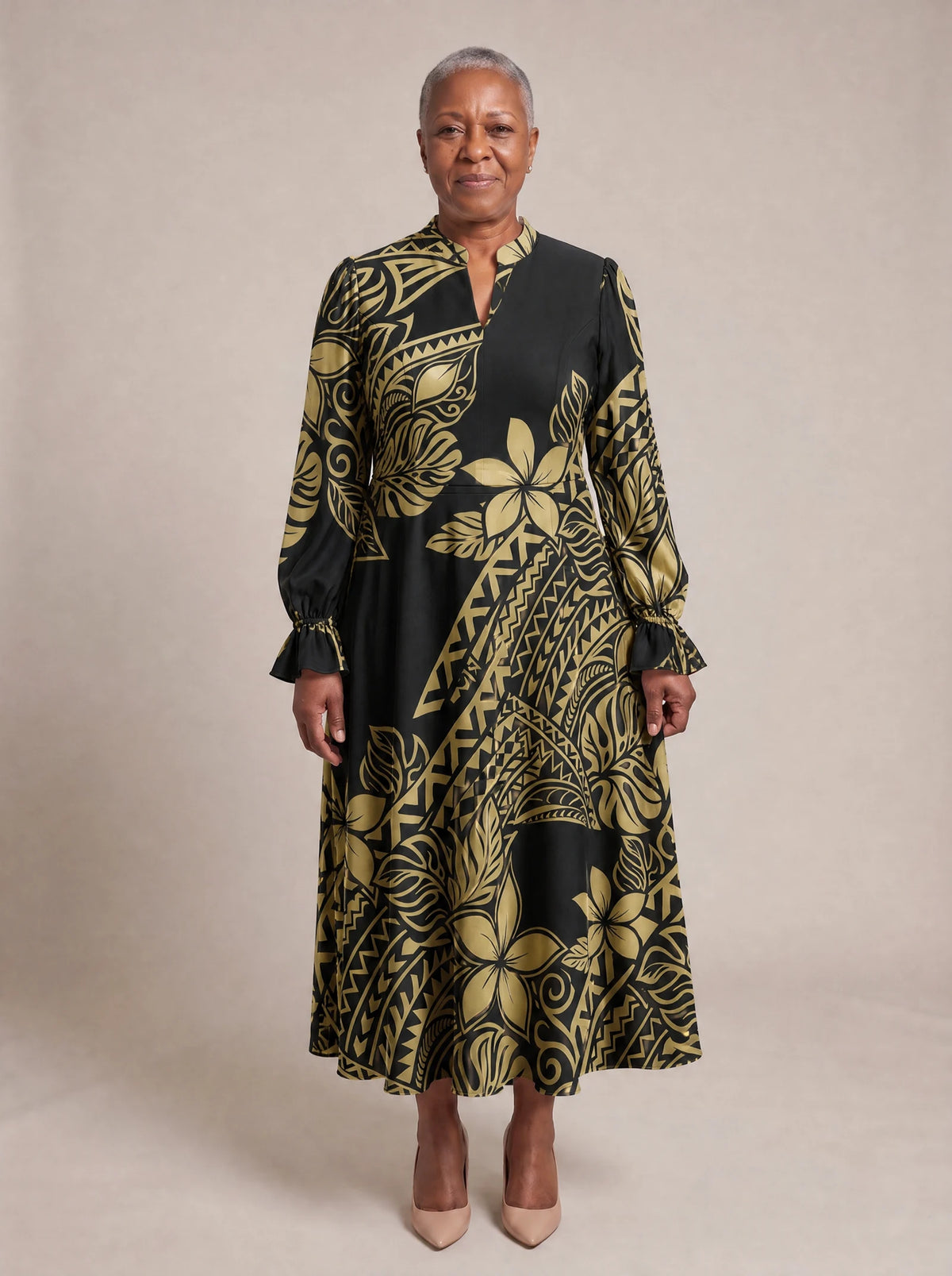 "Pualani" Long Puff Sleeve Dress — standing, angled view on model