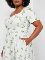 "Yasmini" Sweetheart Midi Dress — close-up of the bodice and the in-seam side pocket