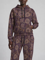"Kitanzi" Plum Gold Hoodie & Jogger Set — close view of the pocket, hem band and jogger waistband