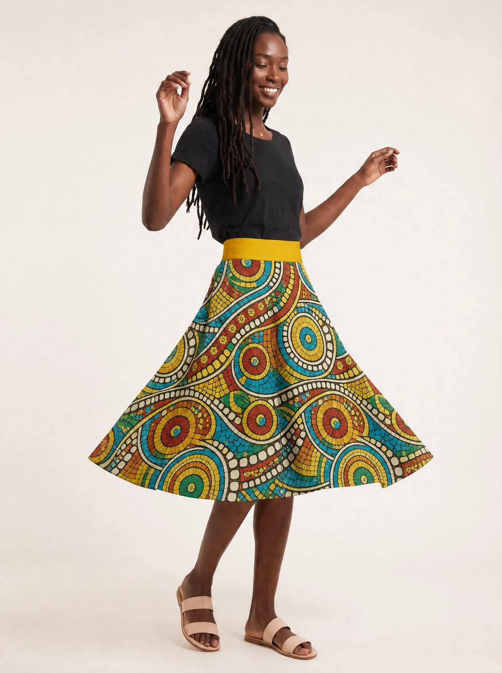 "Taji" Twirl Skirt — twirling, skirt flared out