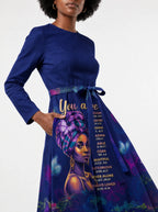 "Blue Orchid" Long Sleeve Midaxi Dress — standing, angled view on model