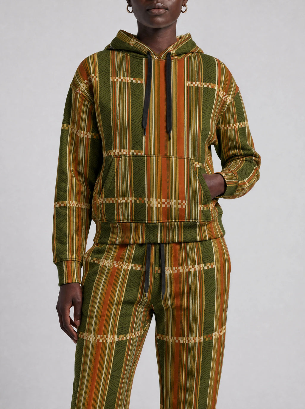 "Safu" Olive Gold Hoodie & Jogger Set — close view of the pocket, hem band and jogger waistband