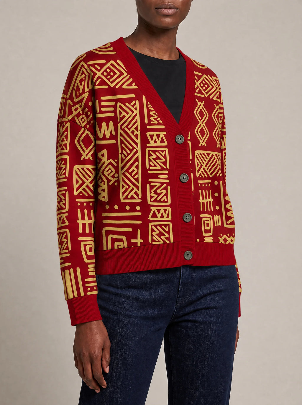 "Alama" Cardigan — close view of the V-neck, buttons and ribbed trims