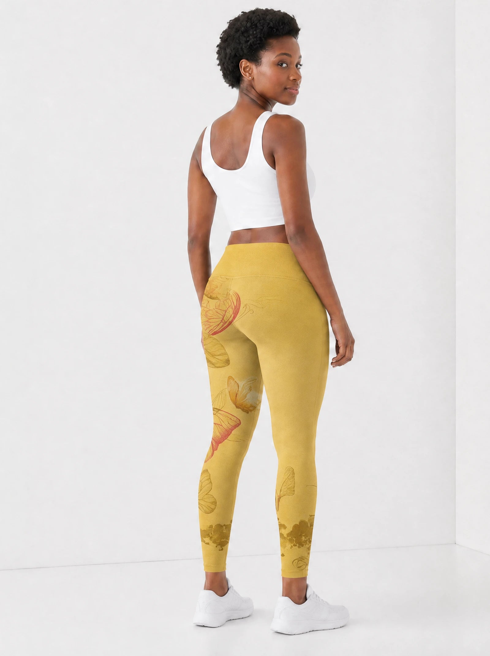 Yellow Orchid Leggings — back view on model