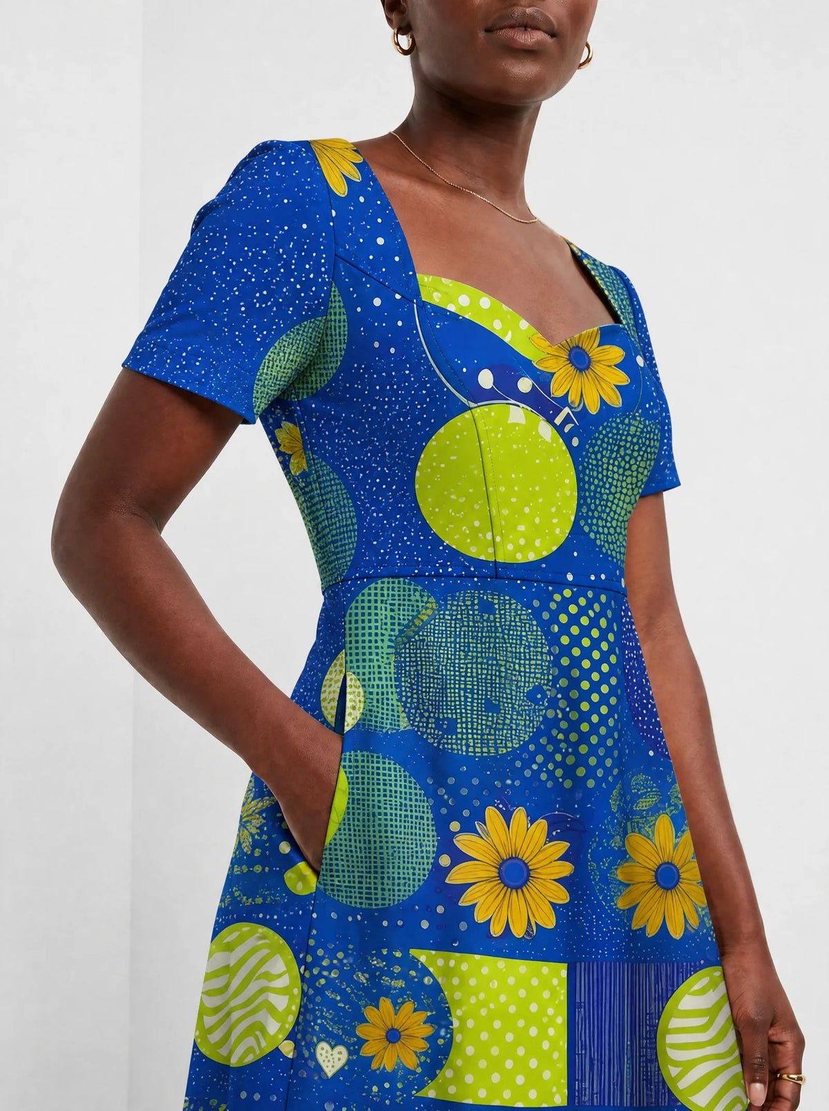 "Mchezo" Sweetheart Midi Dress — close-up of the bodice and the in-seam side pocket