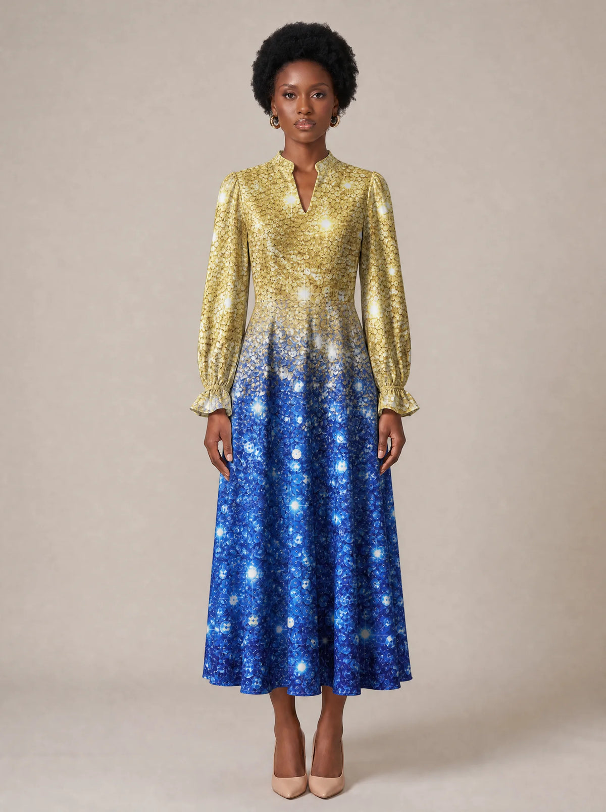 "Angaza" Long Puff Sleeve Dress — standing, angled view on model