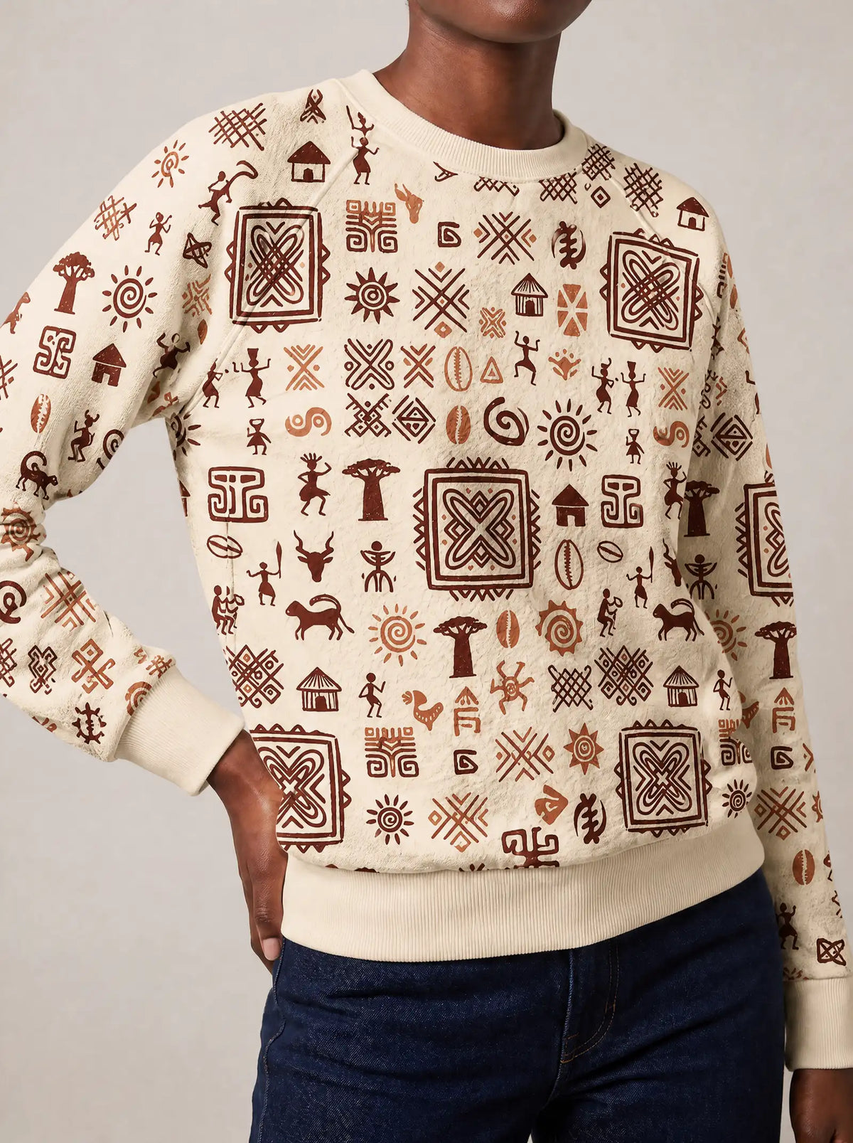 "Hadithi" Sweatshirt — close view of the crew neck, raglan seams and ribbed trims