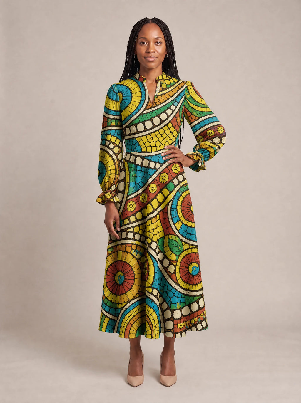 "Taji" Long Puff Sleeve Dress — standing, angled view on model