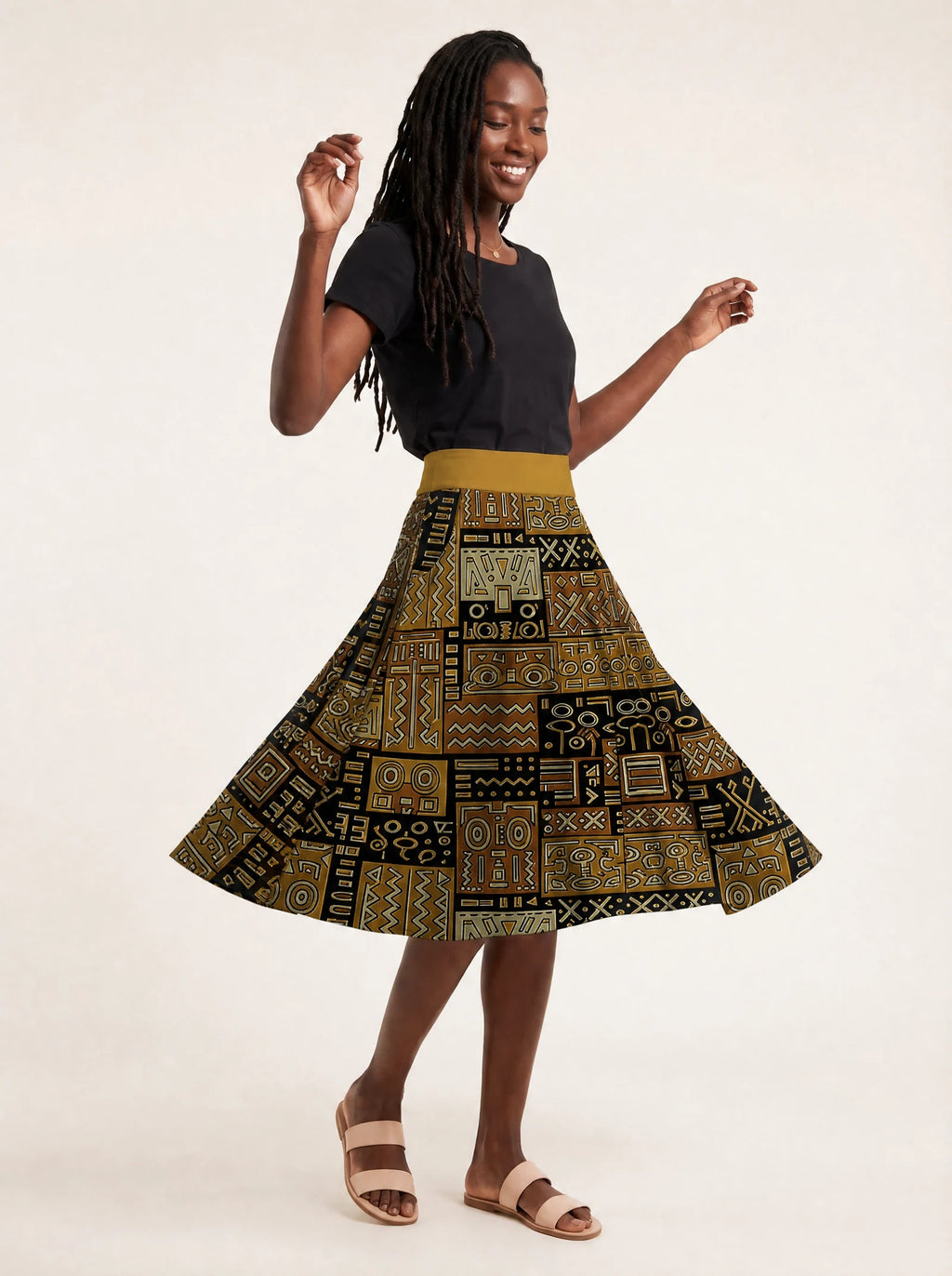 "Sankofa" Twirl Skirt — twirling, skirt flared out