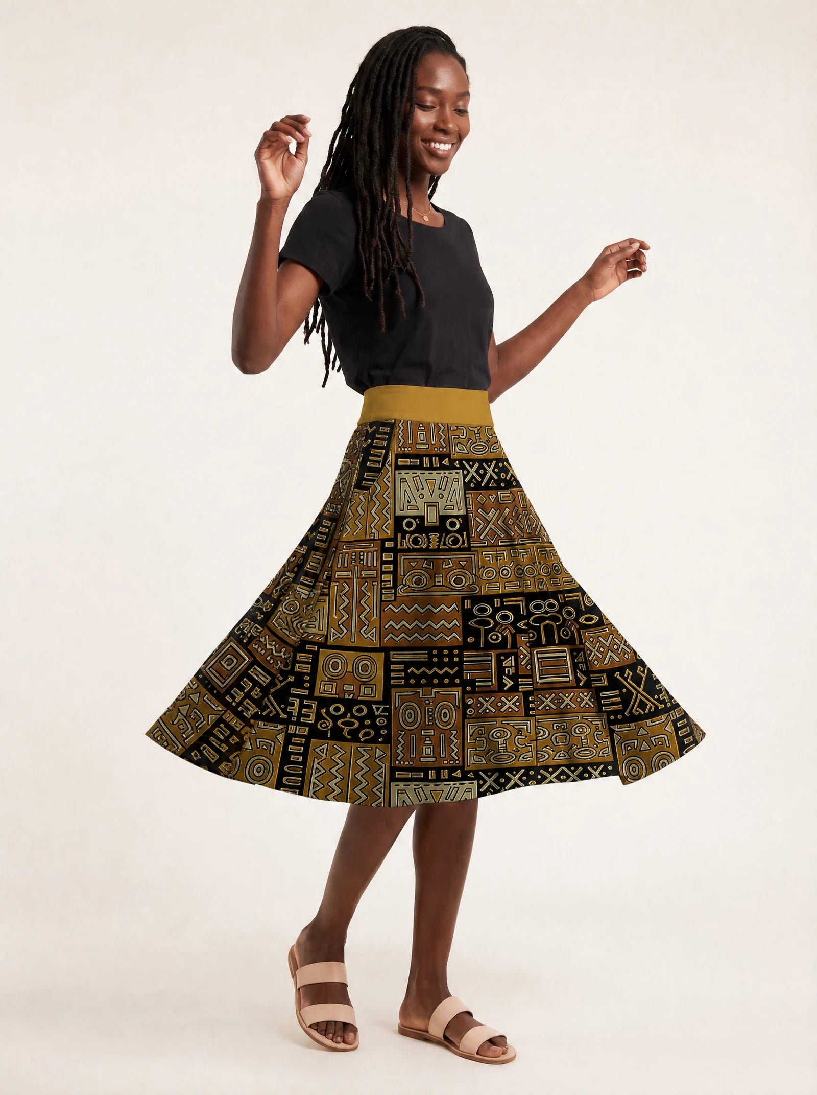 "Sankofa" Twirl Skirt — twirling, skirt flared out
