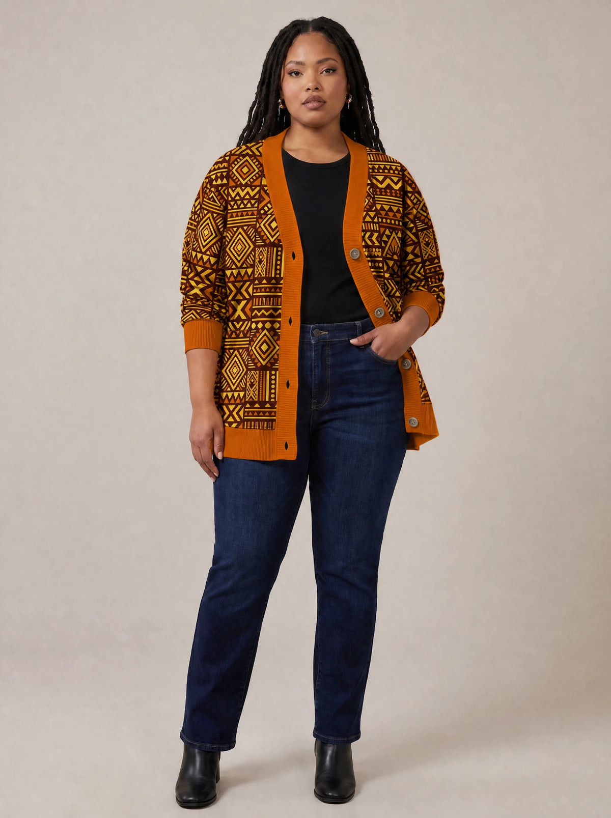 "Mudcloth" Cardigan — on model with hands in her jeans pockets