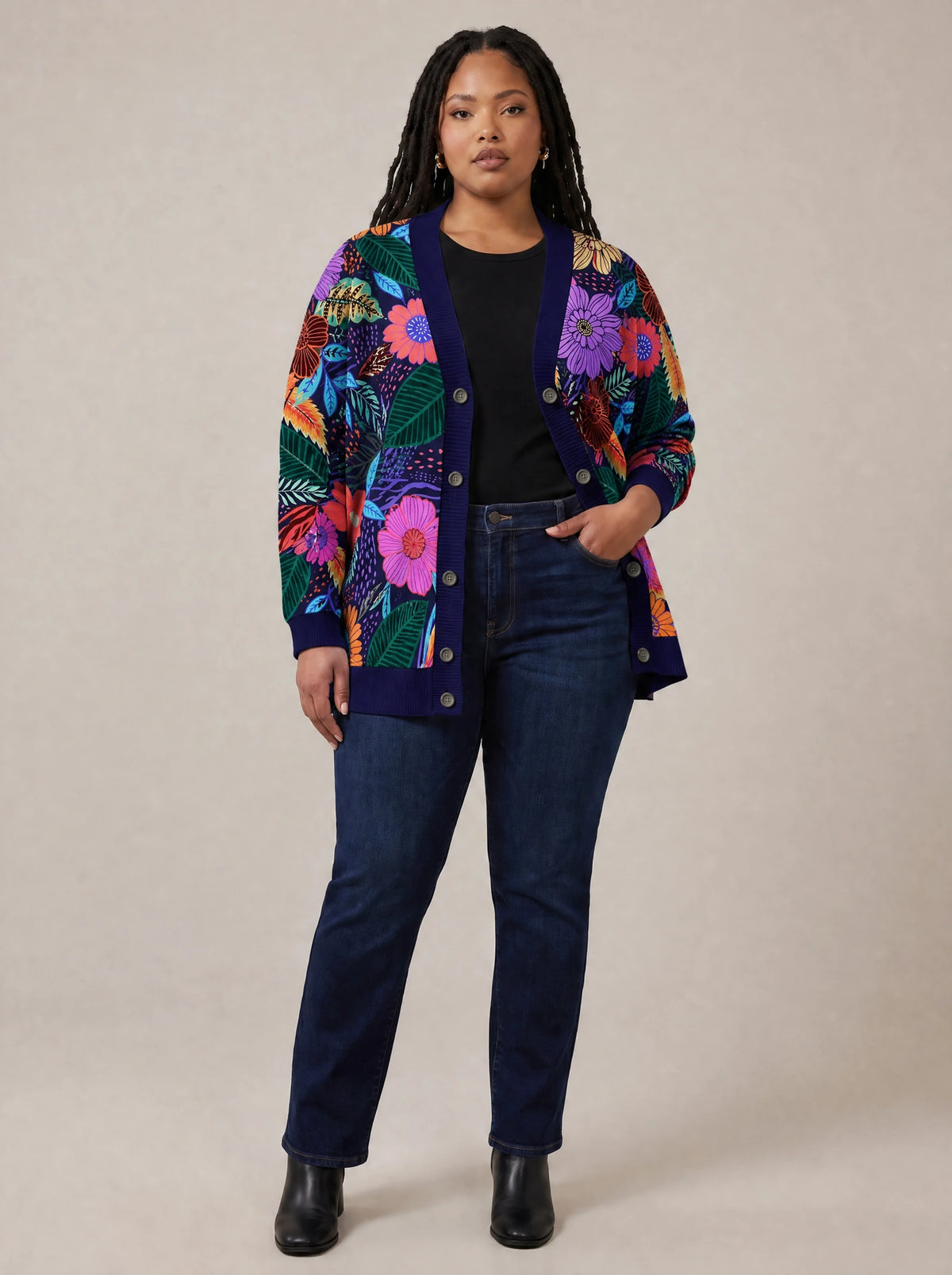 "Bustani" Cardigan — on model with hands in her jeans pockets