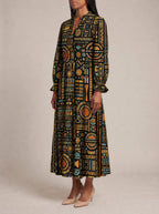 "Afrocentric Pattern" Long Puff Sleeve Dress — three-quarter view on model