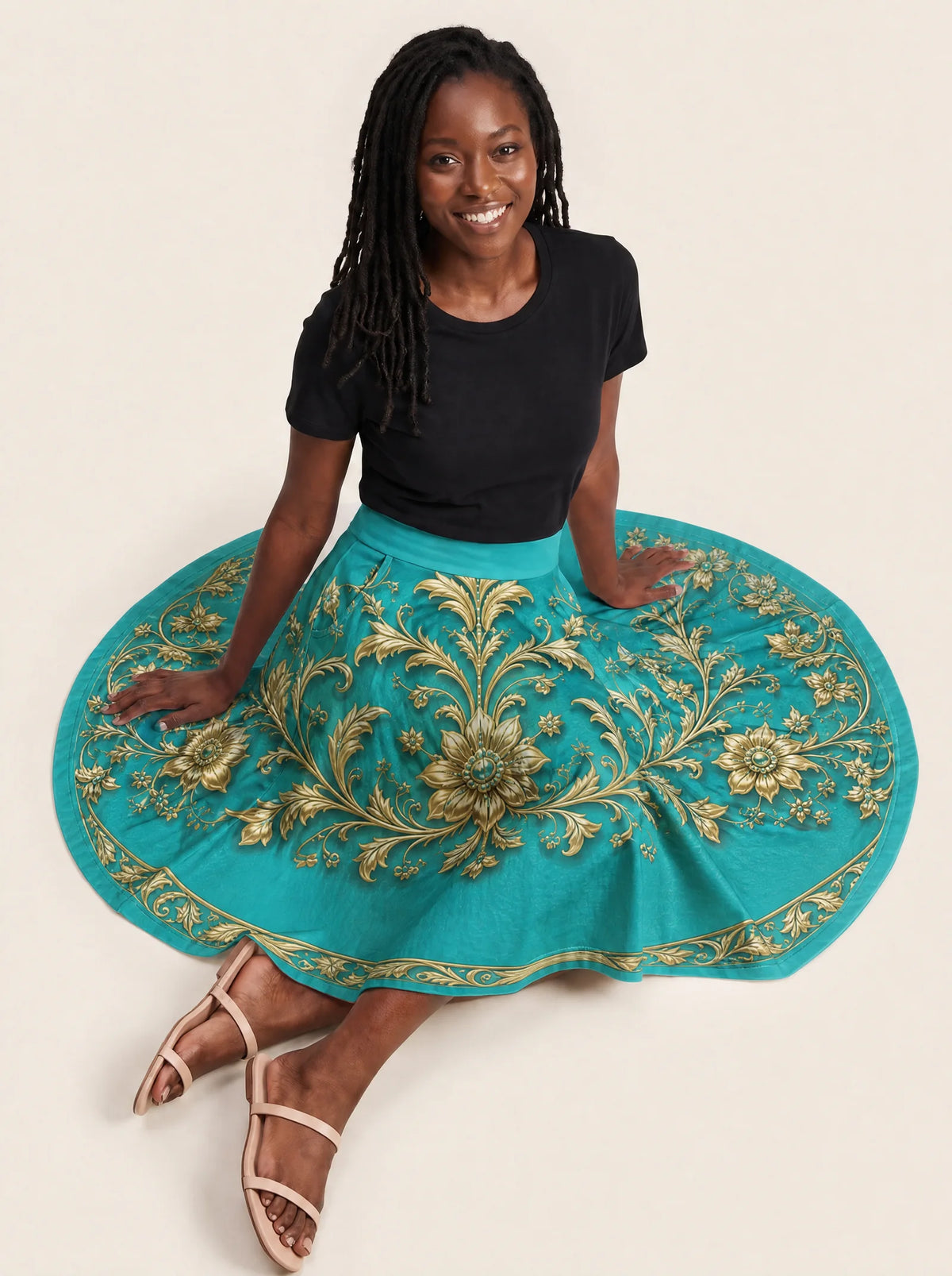 "Heshima" Twirl Skirt — seated on model