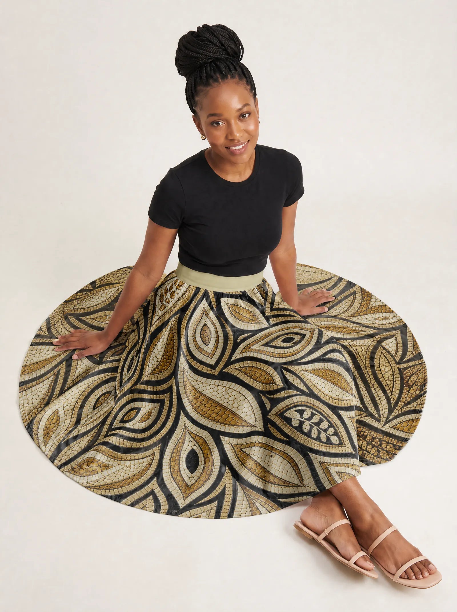 "Ashanti" Twirl Skirt — seated on the floor with the skirt fanned out
