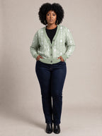 "Oshun Verde" Cardigan — on model with hands in her jeans pockets