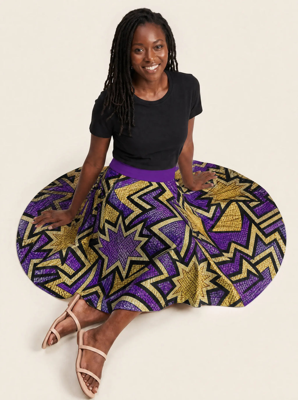 "Sheba" Twirl Skirt — seated on the floor with the skirt fanned out
