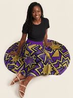 "Sheba" Twirl Skirt — seated on the floor with the skirt fanned out