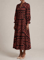 "Shaka" Burgundy Long Puff Sleeve Dress — three-quarter view on model