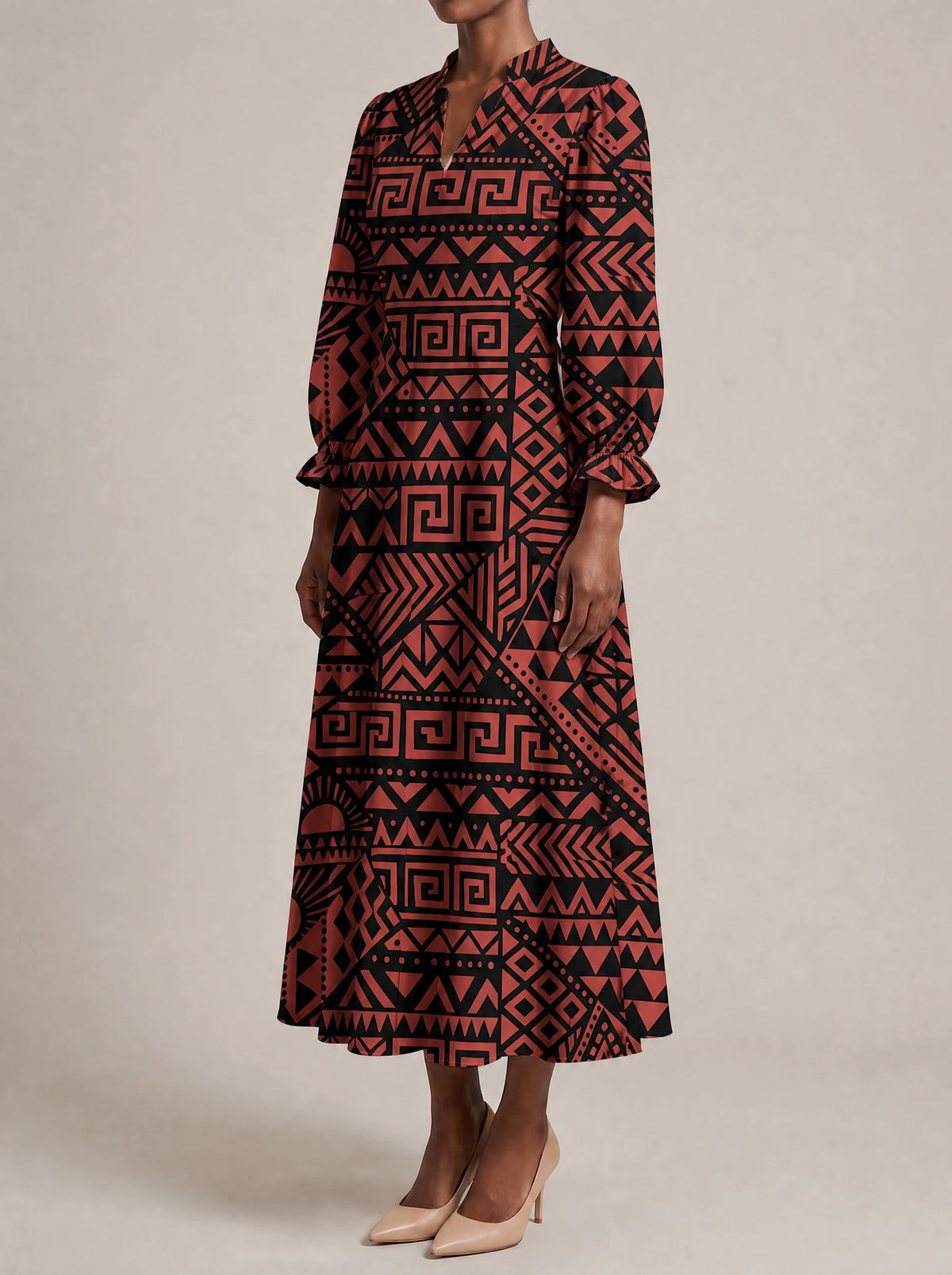 "Shaka" Burgundy Long Puff Sleeve Dress — three-quarter view on model