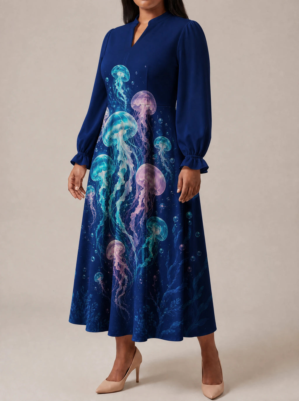 "Bahari" Long Puff Sleeve Dress — three-quarter view on model