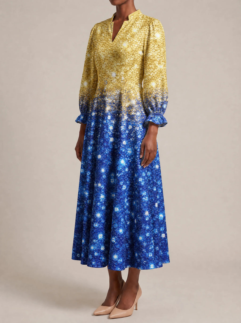 "Angaza" Long Puff Sleeve Dress — three-quarter view on model