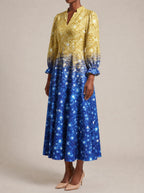"Angaza" Long Puff Sleeve Dress — three-quarter view on model