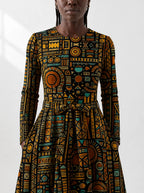 "Afrocentric Pattern" Viscose Midi Dress — close-up of the round neckline and long sleeve