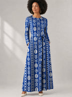 "Oshun" Viscose Midi Dress — close-up of the round neckline and long sleeve