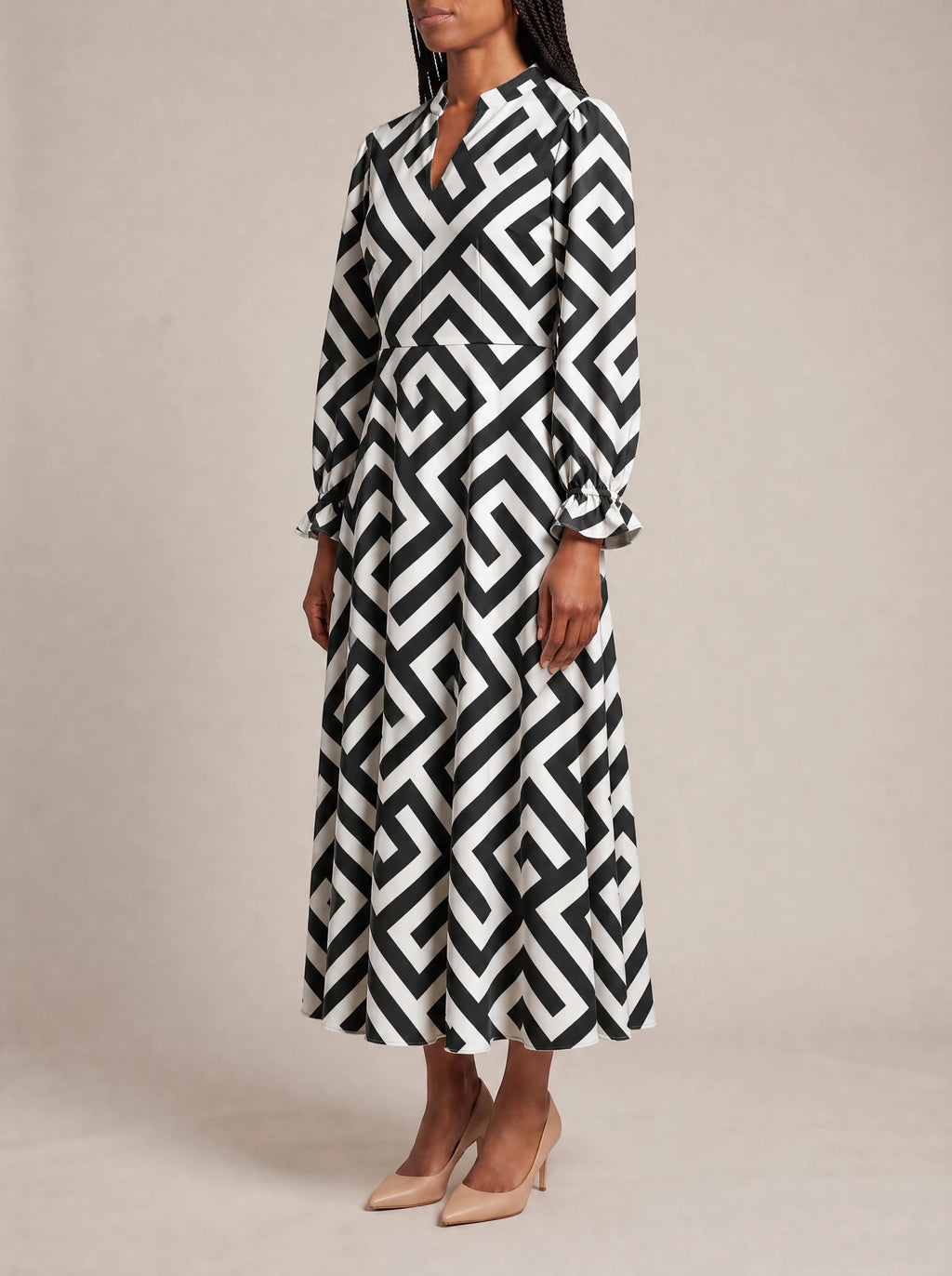 "Zamu" Long Puff Sleeve Dress — three-quarter view on model