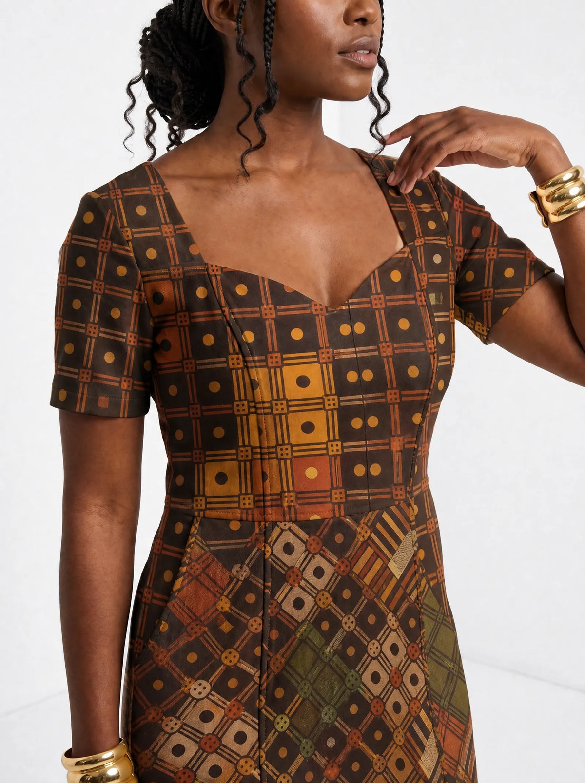 "Mkeka" Sweetheart Midi Dress — close-up of the sweetheart neckline and short sleeve