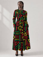 "Nairobi" Viscose Midi Dress — close-up of the round neckline and long sleeve