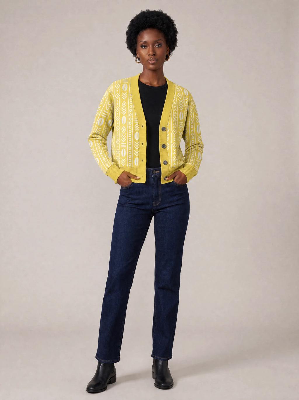 "Oshun Dhahabu" Cardigan — on model with hands in her jeans pockets
