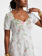 "Chanua" Sweetheart Midi Dress — close-up of the sweetheart neckline and short sleeve