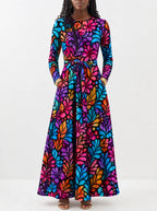 "Rangi" Viscose Midi Dress — close-up of the round neckline and long sleeve