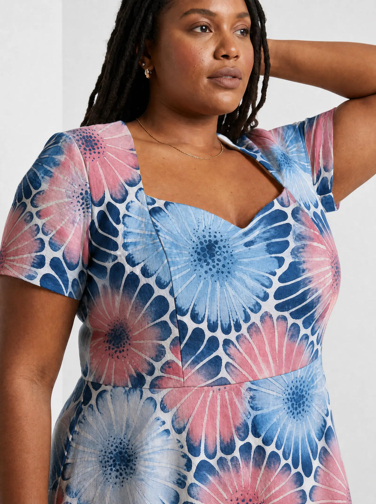 "Samawati" Sweetheart Midi Dress — close-up of the sweetheart neckline and short sleeve