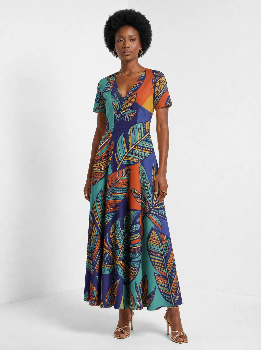 "Majani" Short Sleeve Maxi Dress — three-quarter view on model