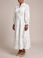 "Chanua" Long Puff Sleeve Dress — three-quarter view on model