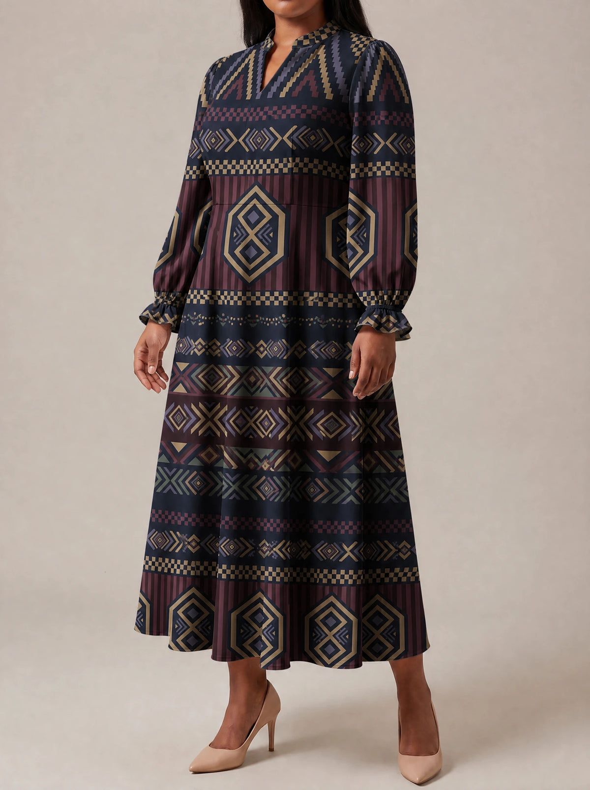 "Msuko" Long Puff Sleeve Dress — three-quarter view on model